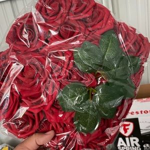 50 pcs artificial red roses.